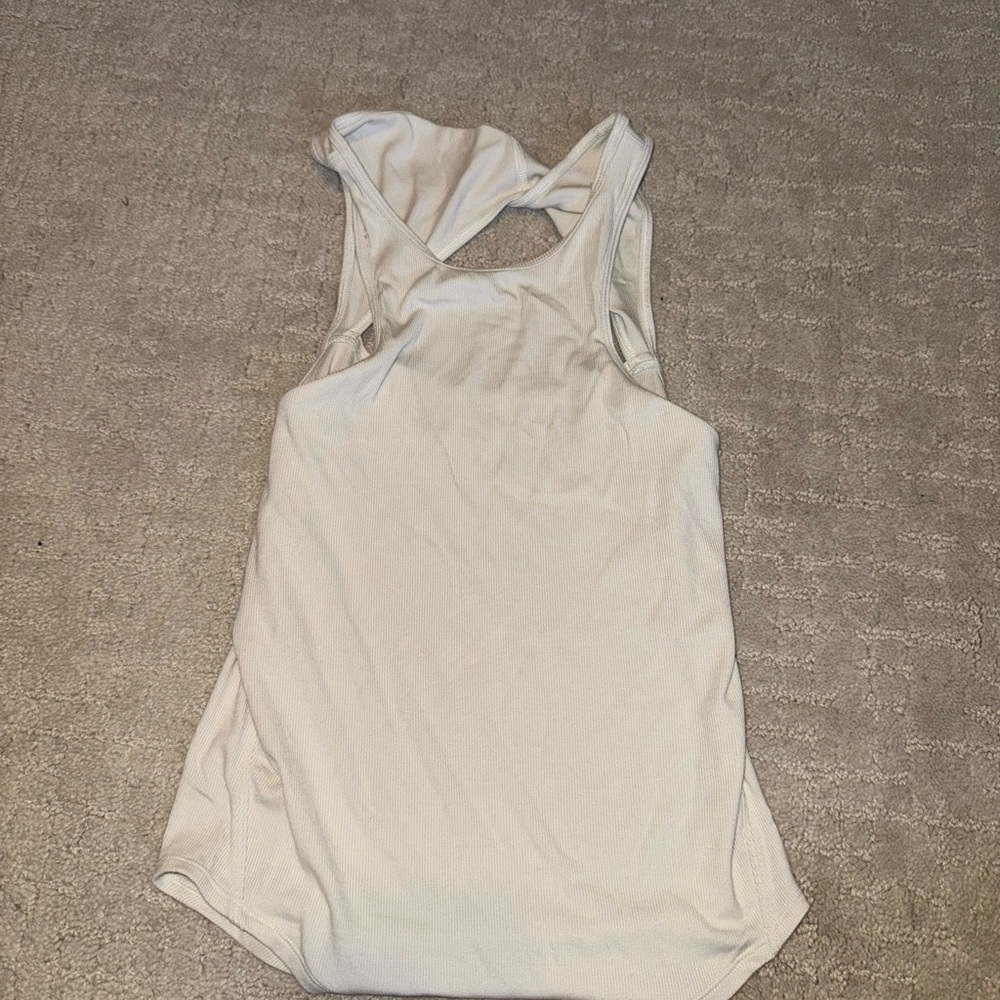 Lululemon Athletica White Asymmetrical Cut Out Tank Top